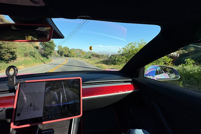 2.5-Hour Hollywood Sign AI-Powered Driving Tour - Downtown overlook from the Hollywood Hills: the skyline payoff