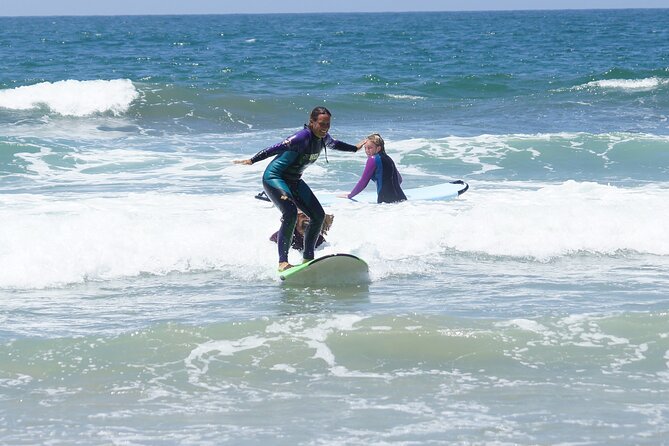 2h of Private Surf Lesson for Beginners in Santa Monica - Into the water: paddling past the break and catching waves