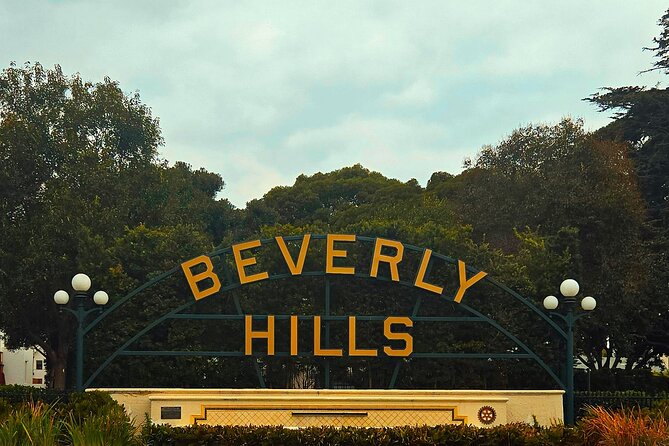 Beverly Hills and Rodeo Drive: A Self-Guided Audio Tour - The Beverly Hills Visitor Center shield: the logo behind the city