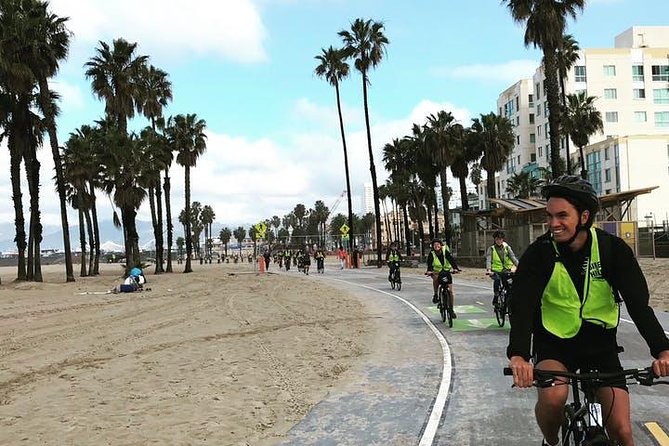 The Ultimate LA Tour: Full Day Sightseeing Tour On Electric Bike - Venice Beach: boardwalk, skate park, Muscle Beach, and canals